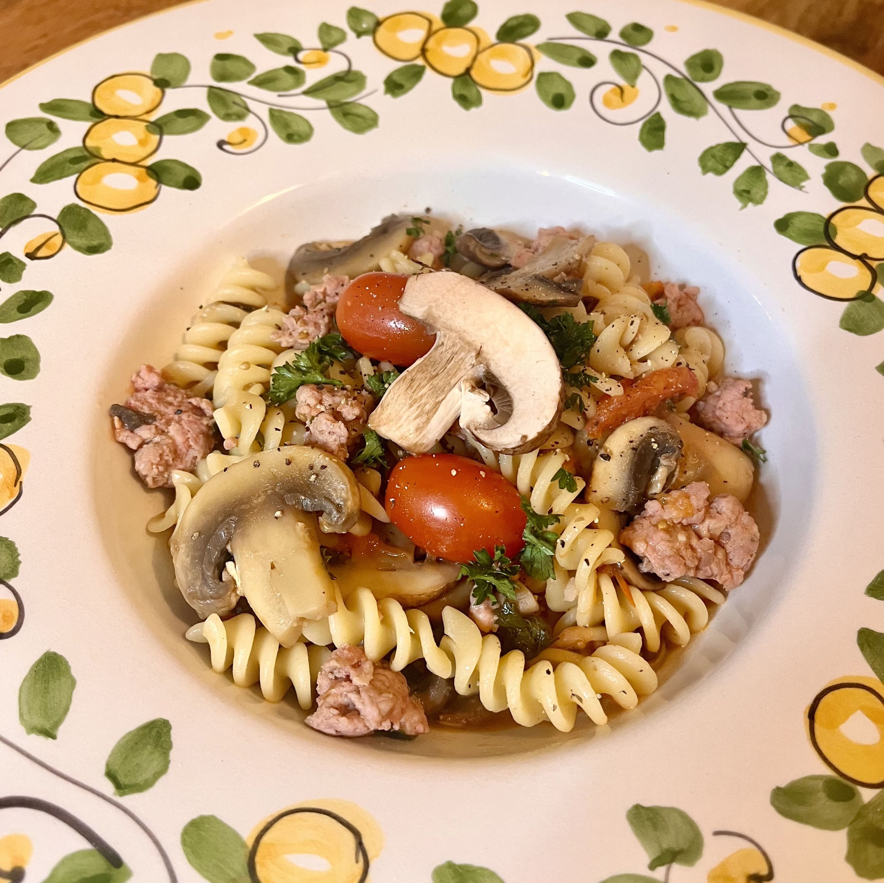 Fusilli with mushrooms and sausage: an authentic Italian recipe