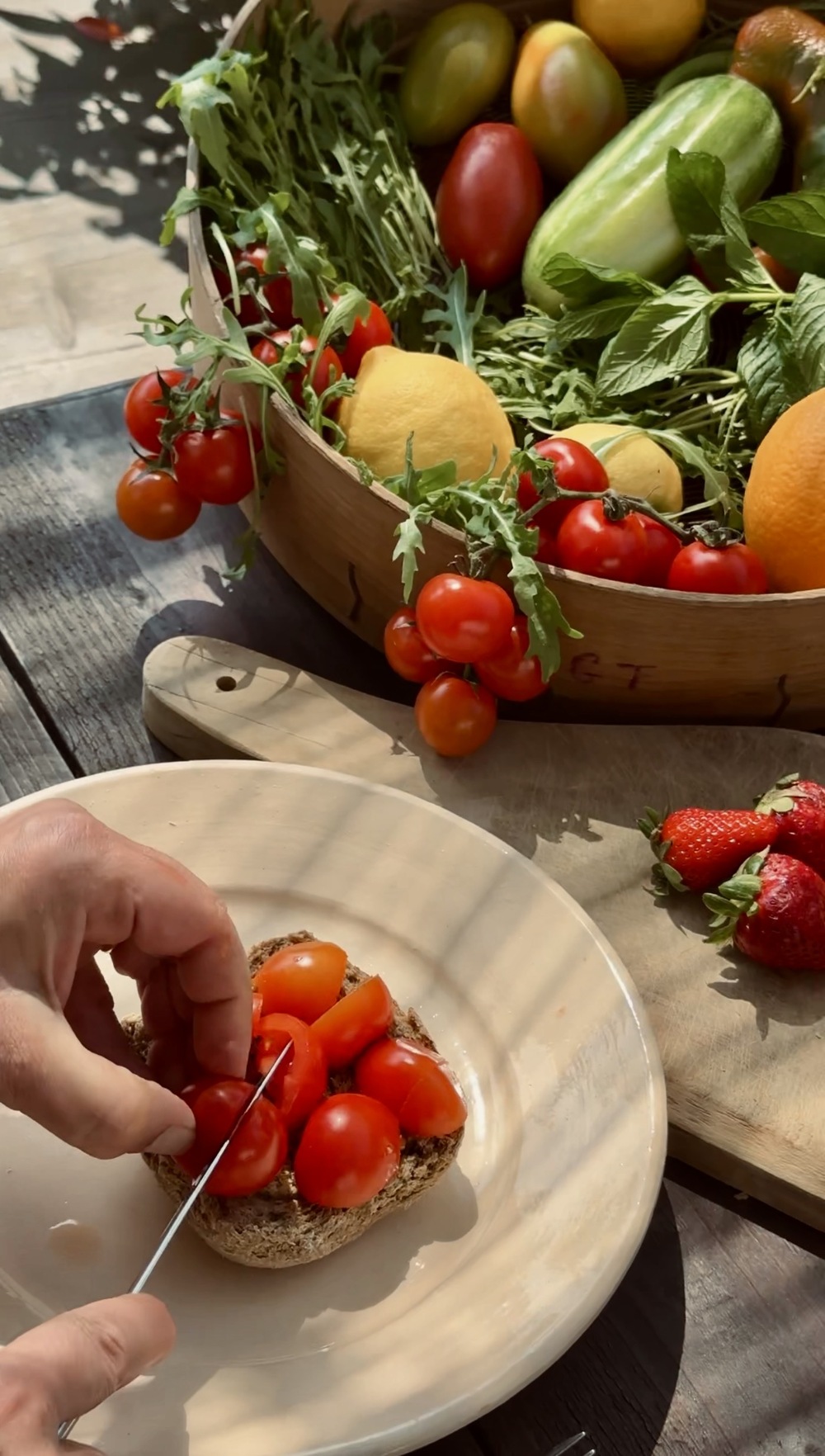 Traditional Salento frisa bread topped with tomatoes, olive oil, and oregano