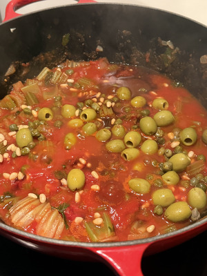 Sicilian caponata step 5: olives, capers, and pine nuts